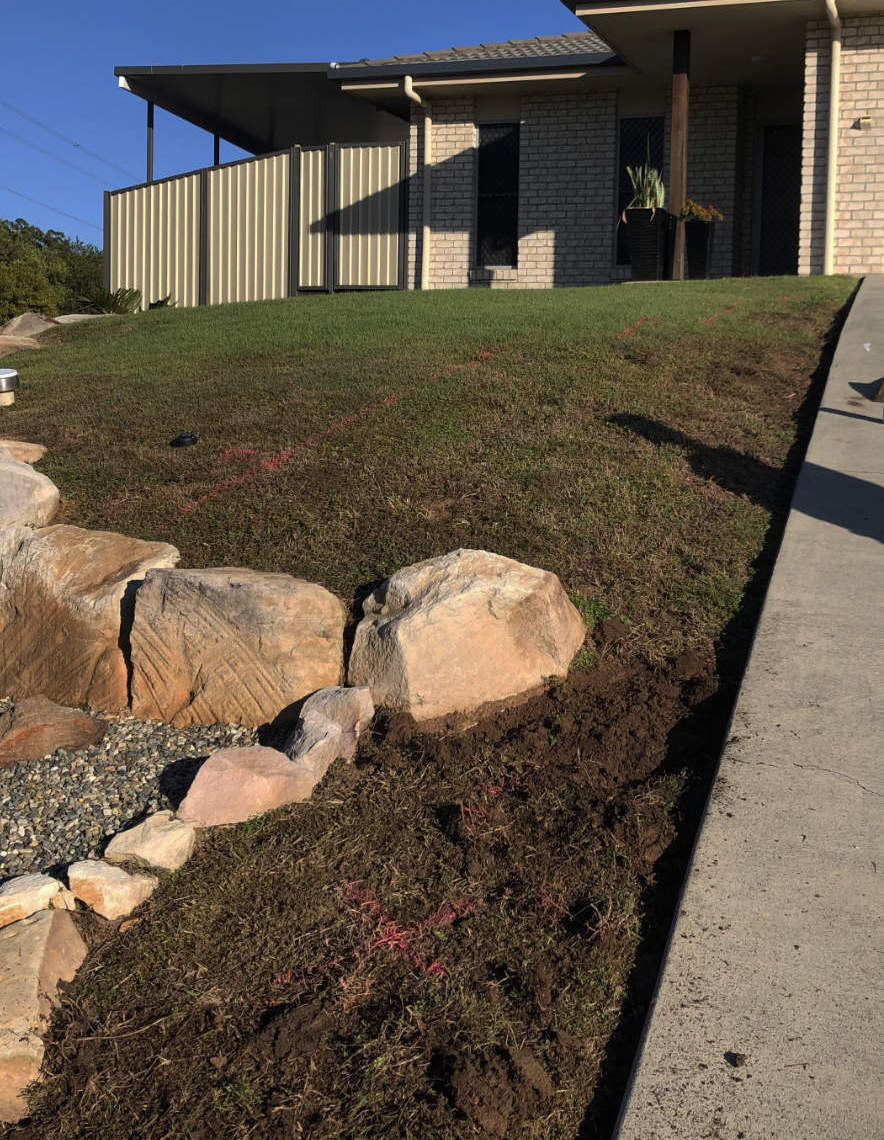 Ground levelling and turfing